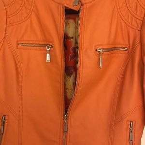 Orange jacket very versatile, elevate any look